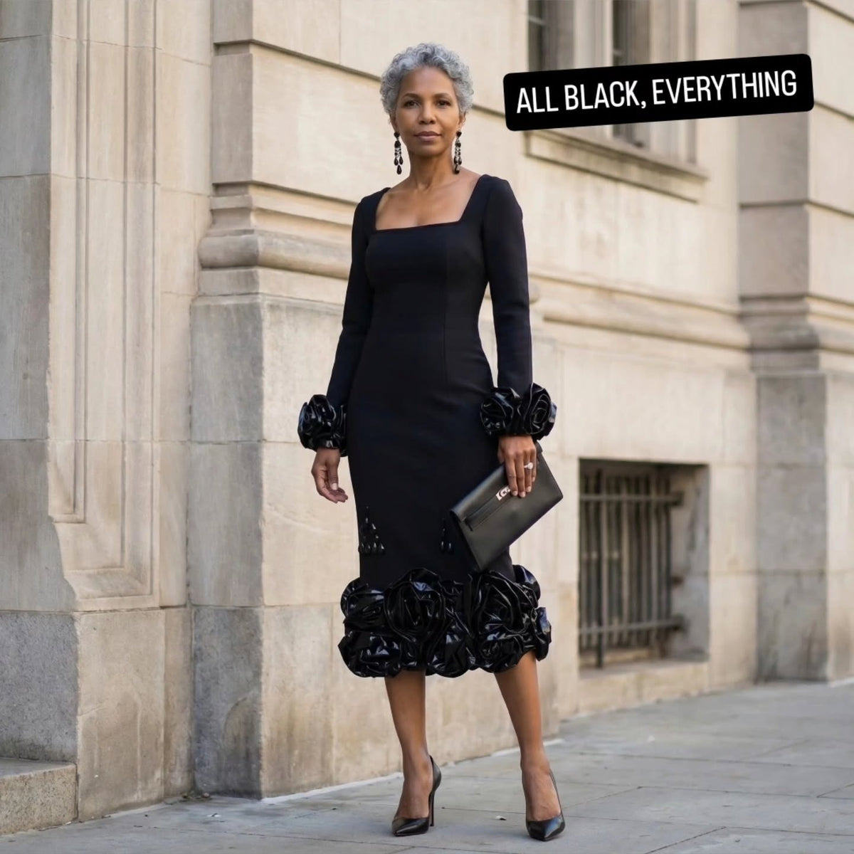 Gloria Joy Rivers wearing the Flower Cuff Bandage dress in Black