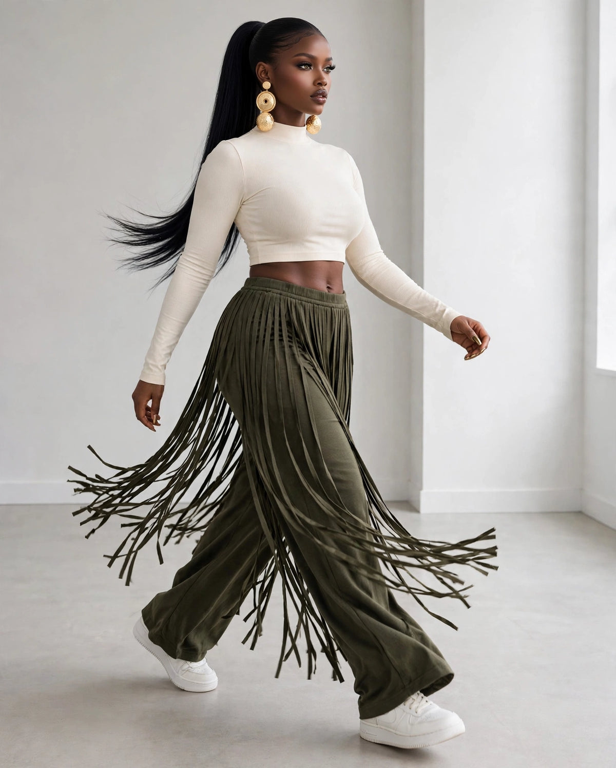 Fringe Overlay Pant in olive green, worn walking so the fringe swings